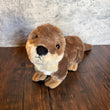 Load image into Gallery viewer, Running Otter Stuffed Animal
